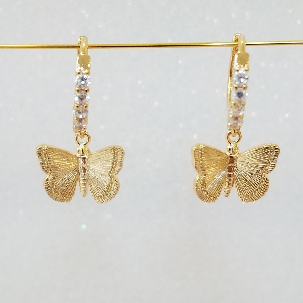 Gold butterfly charm huggie hoop earrings